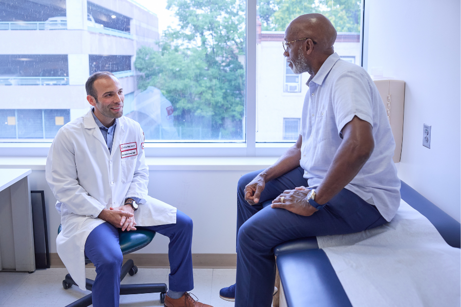 Dr.Malamood with a patient