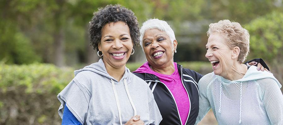 Women walking, laughing together
