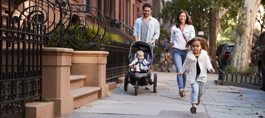 family walking street