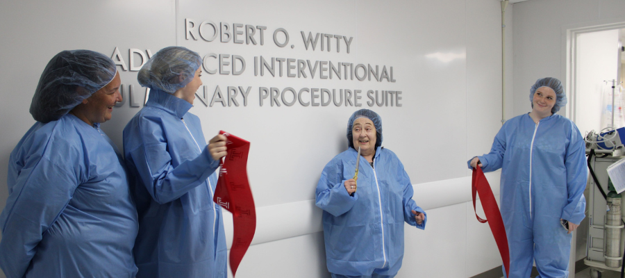 Nancy Witty cutting the red ribbon