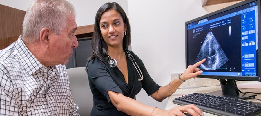 Anjali Vaidya going over results with CTEPH patient