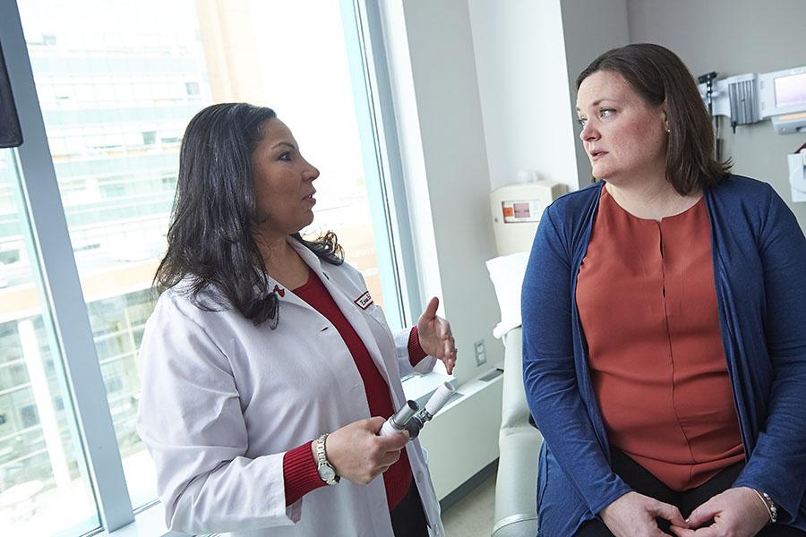 Dr. Eman Hamad with heart failure patient