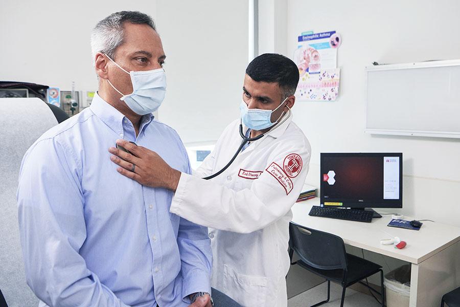 Patient having an in-person appointment with Dr. Shenoy