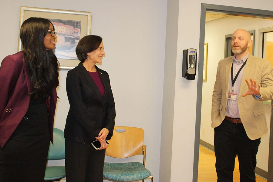 Patrick Vulgamore discusses the Substance Use Disorder Clinic's work with Drs. Davis-Jones and Arkoosh (below).