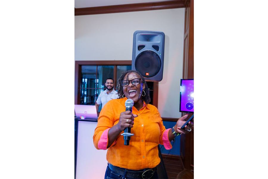 An employee sings her heart out at the Women & Families Campus.