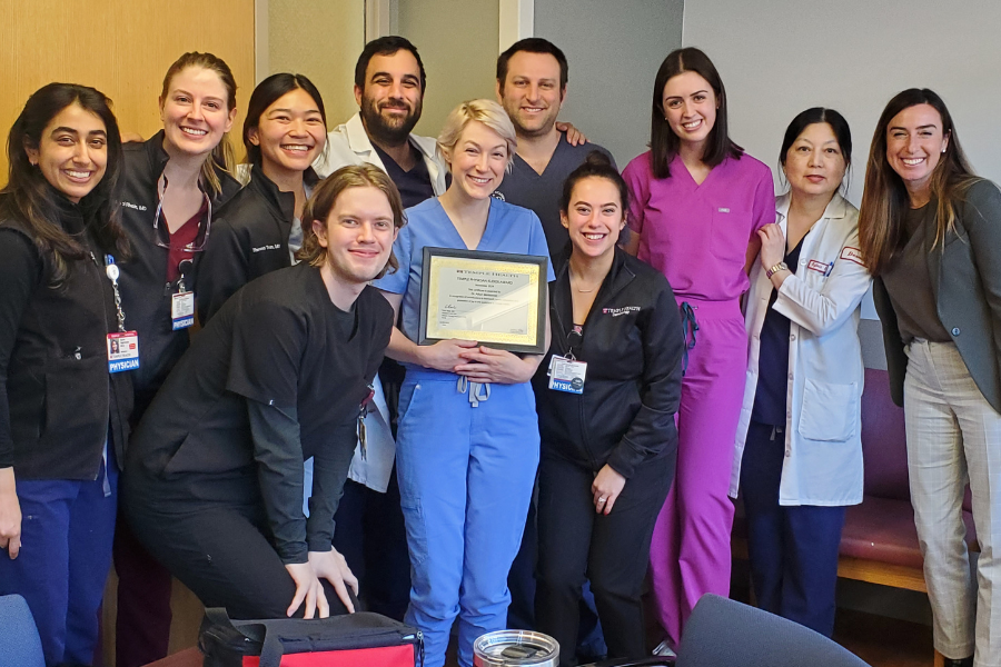 Dr. Metkowski (center) celebrates her achievement with some of the other Dermatology faculty members. 