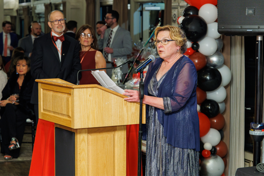 Barbara Brown, Stephen's high school biology teacher, accepts her Princess Leia Award.