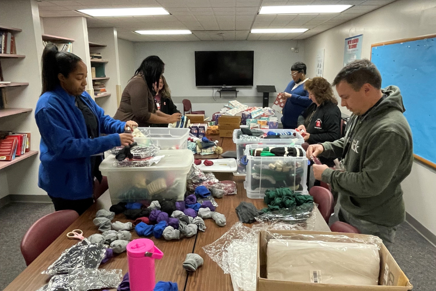 Episcopal team members hard at work getting the gift bags ready.