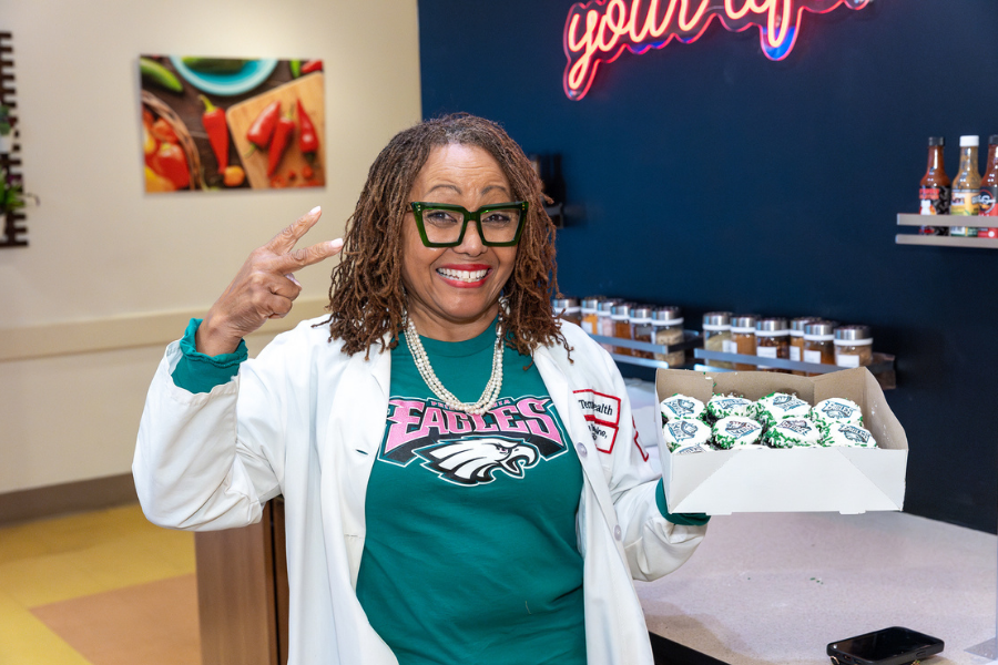 Wouldn’t you be as excited as this Temple Health-Chestnut Hill Hospital employee about Eagles cupcakes?
