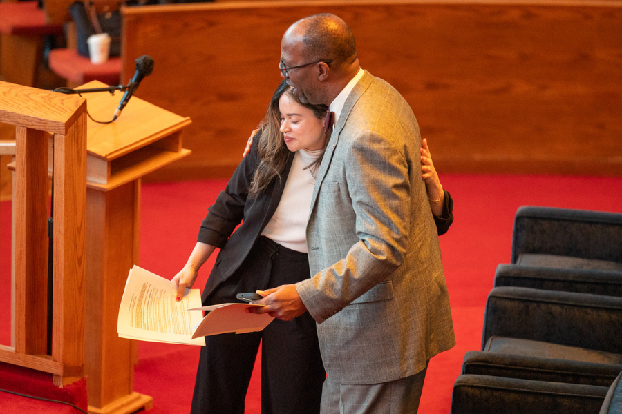 Elizabeth Johnson, granddaughter of the Reverend Dr. Leon H. Sullivan, with the Reverend Mike Major.