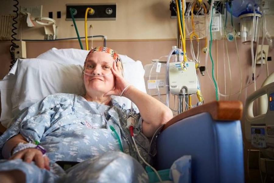 Temple patient, Lisa, in her hospital bed