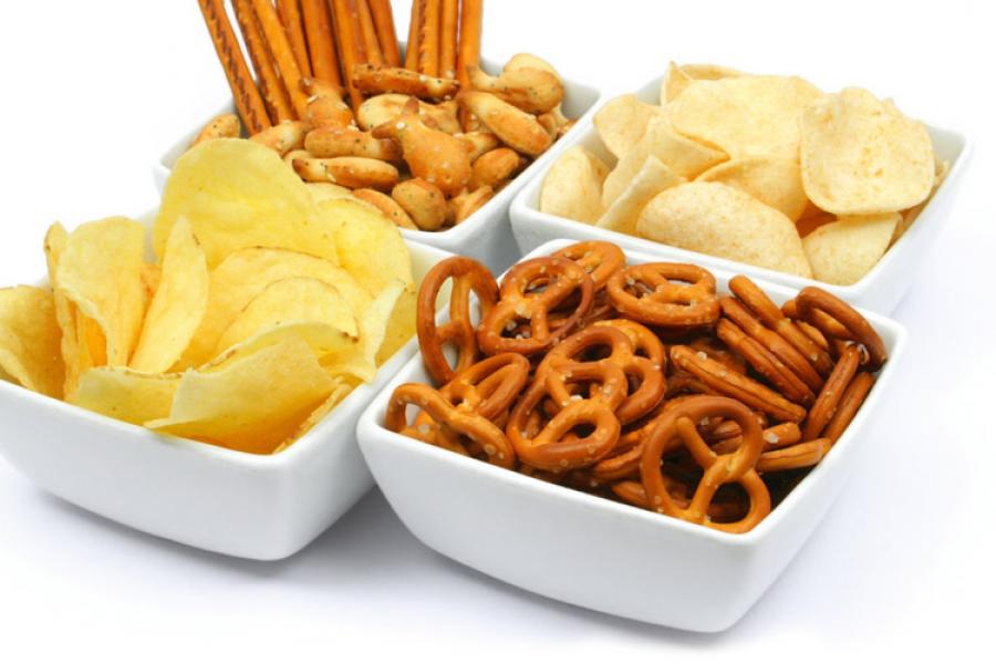 4 bowls of pretzels and chips
