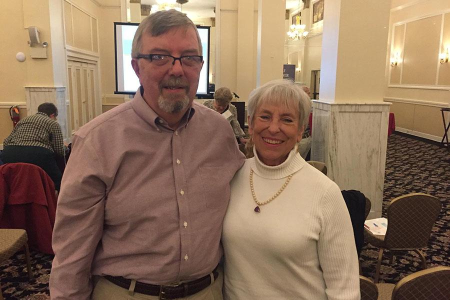 Two people supporting each other