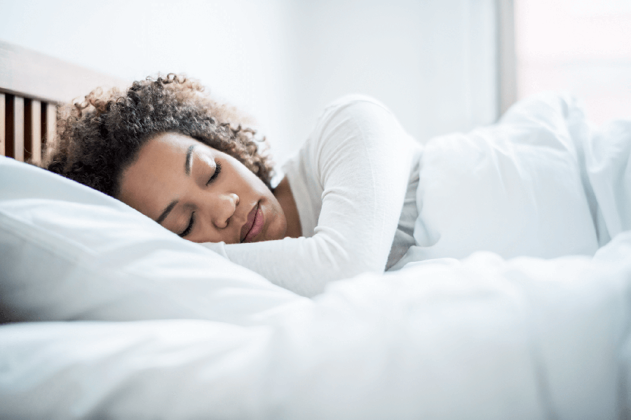 Woman sleeping in bed