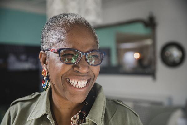 Woman with glasses smiling