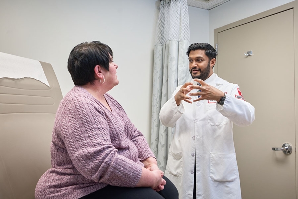 Dr. Rohit Soans with a patient