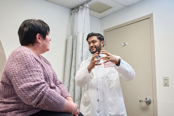 Dr. Rohit Soans talking about bariatric surgery with a patient