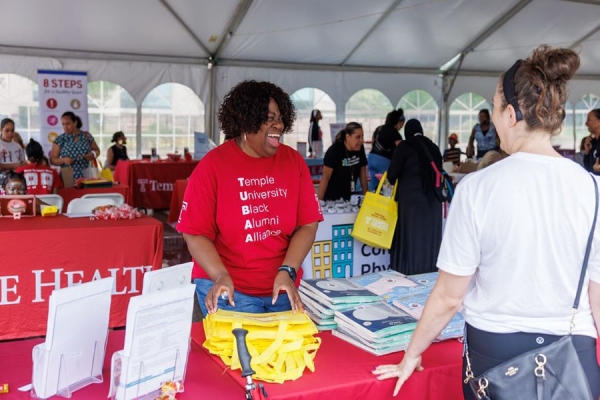 Temple Health worker distributing supplies