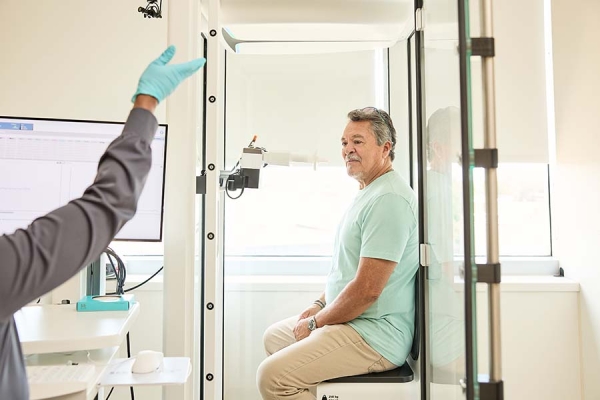 Man receiving spirometry screening