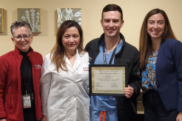 Dr. Peace (center right) with Amy J. Goldberg, MD, FACS, The Marjorie Joy Katz Dean of the Lewis Katz School of Medicine (far left); Dr. Salamanca-Padilla (center left); and Claire Raab, MD, President & CEO of Temple Faculty Physicians (far right). 