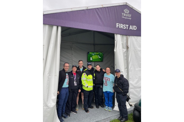 Temple Health team members at the Truist Championship, including Yann Helouvry (far left) and Dr. Alexander McGinley, Assistant Professor of Clinical Emergency Medicine at The Lewis Katz School of Medicine at Temple University (third from left), as well as Kristen Kovacs, Deputy Chief of the Whitemarsh Community Ambulance Association (fourth from left).