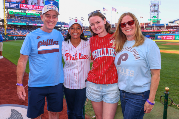 Lauren and Dr. Vaidya (center left) with Lauren’s parents, Brenda and Chris. Courtesy of the Philadelphia Phillies.