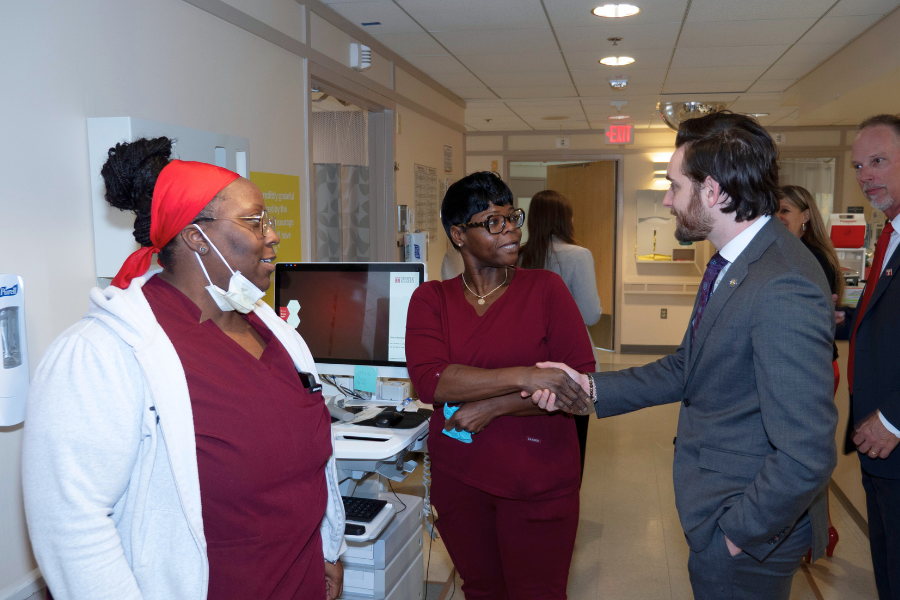 Senator Picozzi and Representative Dougherty with Jeanes employees, community members, and leadership during their visit to TUH-Jeanes Campus.