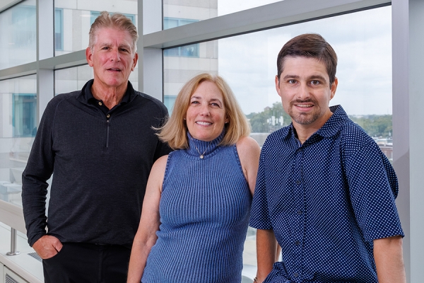 Kevin C. with his parents
