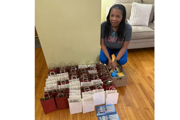 Temple Women & Families Hospital NICU nurse Antonnette Thompson preparing care packages for her colleagues.